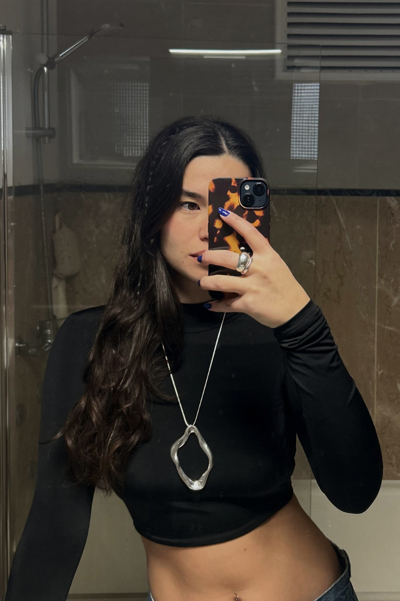 Amalfi silver-plated necklace worn with chunky silver bracelet Amalfi silver-plated necklace close-up detail